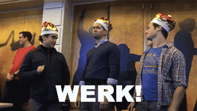 Men in Crowns Standing in Front of Werk Wall