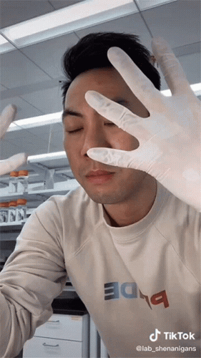Men In Dark Room Wearing Thieves Shirts GIF