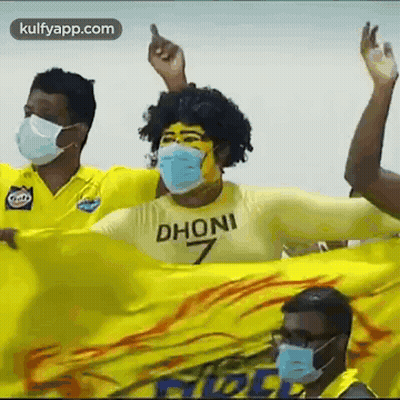 Men In Face Masks Holding Yellow Flag GIF