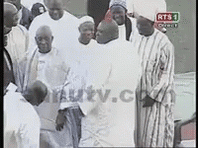 Men In Front Of TV Saying RTS 1 GIF
