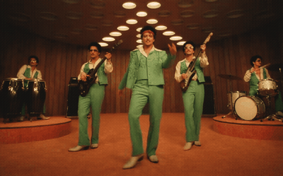 Men In Green Suits Playing Instruments GIF