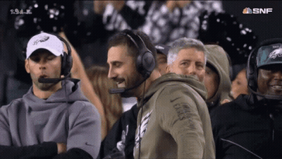 Men In Headphones Watching Football On NBC GIF