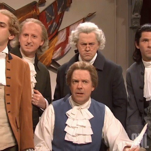 Men In Historical Costumes With Blue Vest And Ruffles GIF