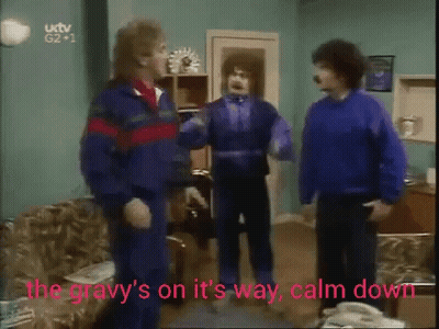 Men In Living Room Gravy's On Its Way Calm Down GIF