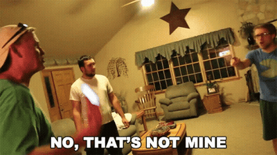 Men In Living Room Saying No That's Not Mine GIF