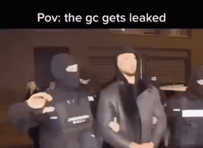 Men In Masks Standing Together GIF