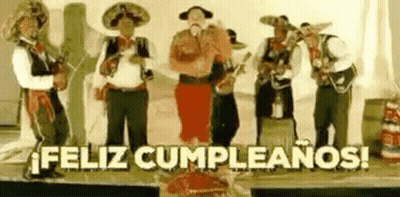 Men In Mexican Costumes Playing Instruments GIF