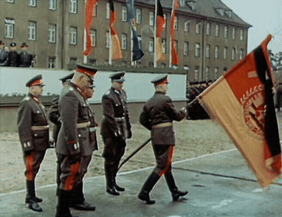 Men In Military Uniforms Carrying CCCP Flag GIF