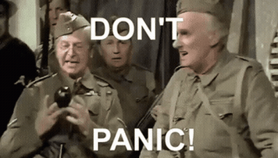 Men In Military Uniforms Holding Bomb GIF