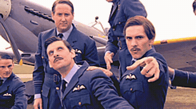 Men In Military Uniforms Posing In Front Of Plane GIF