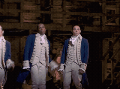 Men In Military Uniforms Standing In Dark Room GIF