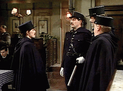 Men In Military Uniforms Standing Together GIF