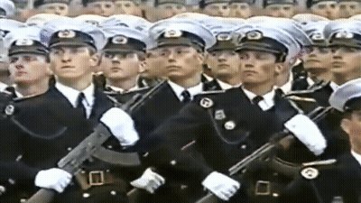 Men In Military Uniforms With B Hats GIF