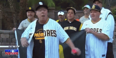 Men In Padres Jerseys In Front Of Brick Wall GIF