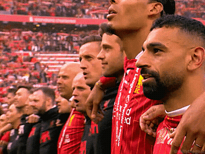 Men In Red And Black Striped Jerseys With Letter A GIF