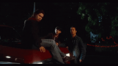 Men In Red Jacket And Black Shirt GIF