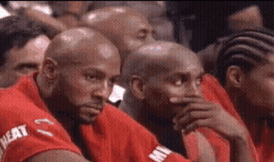 Men In Red Shirts Sitting In Stadium GIF