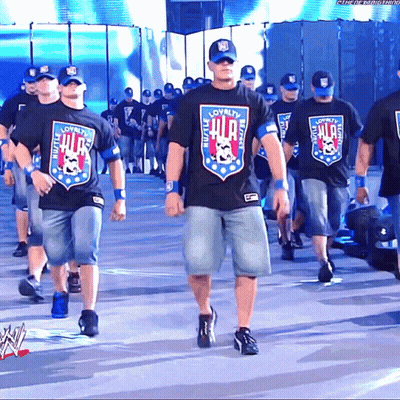Men In Shirts Saying Loyalty Hustle And Respect Walking On Stage GIF