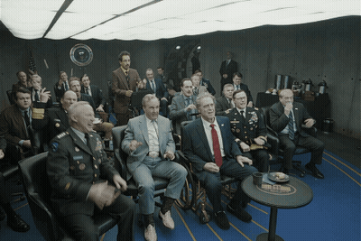 Men In Suits And Military Uniforms At Bush Stadium Table GIF