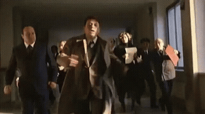 Men In Suits And Ties Dancing In Hallway GIF