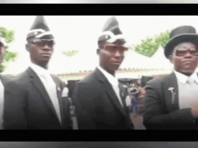 Men In Suits And Top Hats Standing In Line GIF