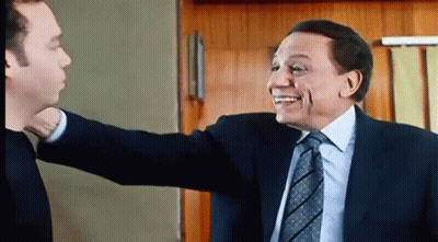 Men In Suits Hugging GIF