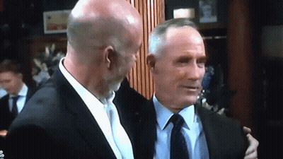 Men In Suits Hugging GIF