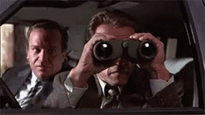 Men In Suits Looking Through Binoculars GIF