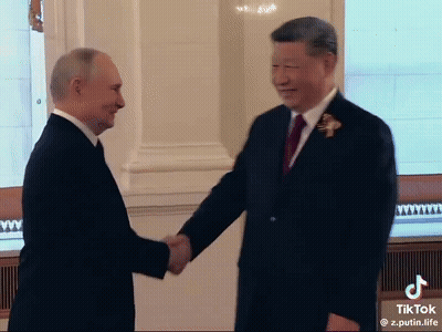 Men In Suits Shaking Hands GIF