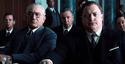 Men In Suits Sitting Around Table GIF