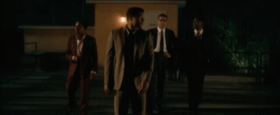 Men In Suits Standing In Dark Parking Lot GIF