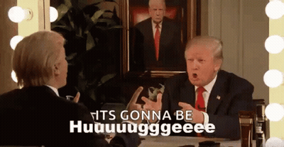 Men In Suits Talking In Front Of Trump Painting GIF