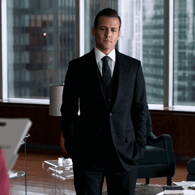 Men In Suits Walking Down Hallway GIF