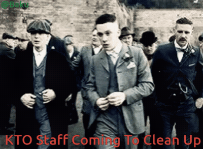 Men In Suits Walking With Kto Staff Coming To Clean Up GIF