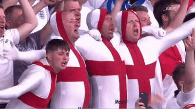 Men In White And Red Outfits With Cross GIF