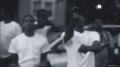 Men In White Shirts Standing In Front Of Car GIF