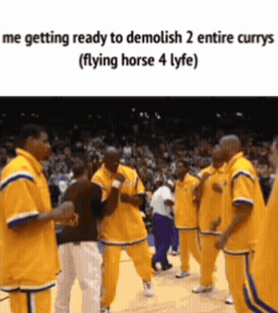 Men in Yellow Uniforms on Basketball Court Talking