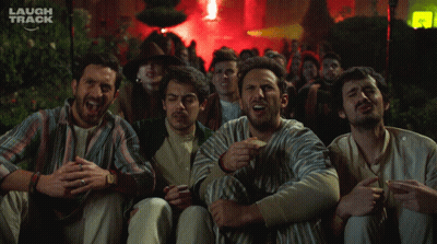 Men Laughing In Front Of Laugh Track Sign GIF