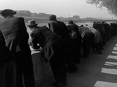 Men On Sidewalk Looking At River GIF