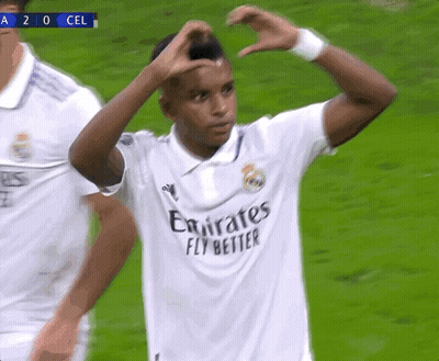 Men On Soccer Field One Wearing Emirates Shirt GIF