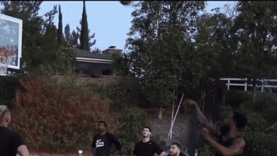 Men Playing Basketball On Court GIF