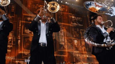 Men Playing Brass Instruments With Cancela Sign GIF