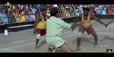 Men Playing Game in Front of Crowd