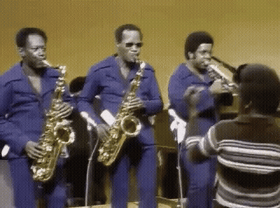 Men Playing Saxophones In Band GIF
