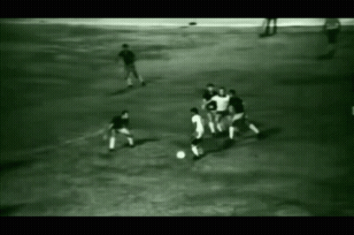 Men Playing Soccer Number 3 GIF
