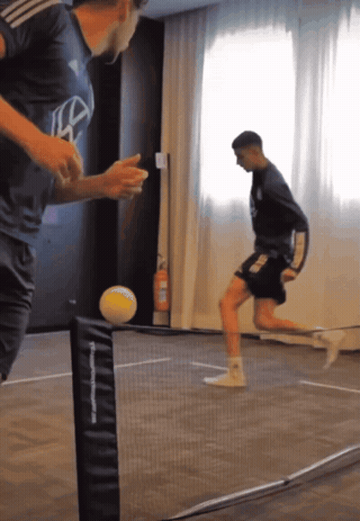 Men Playing Soccer With TF Sports Net GIF
