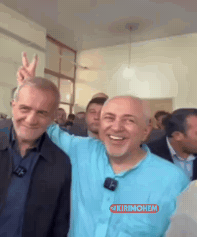 Men Posing One In Blue Shirt With Microphone GIF