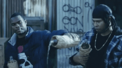 Men Pouring Into Hand With Oon Graffiti GIF