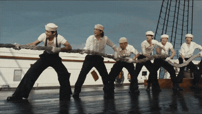 Men Pulling Rope On Ship GIF