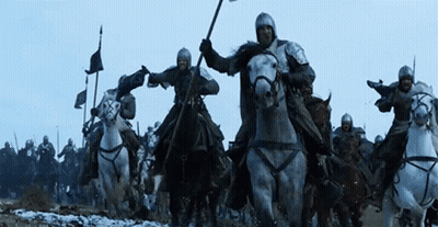 Men Riding Horses In Field GIF